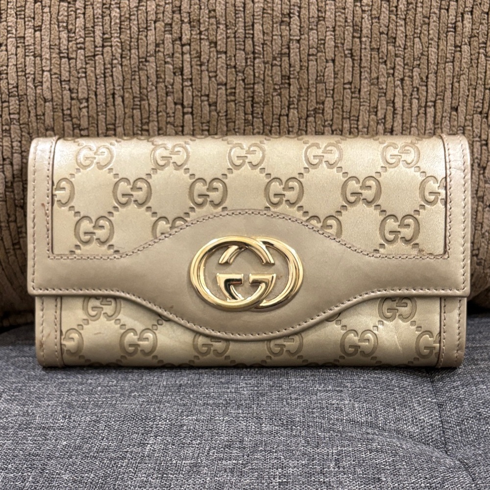 Gucci Gold Monogram Leather Wallet